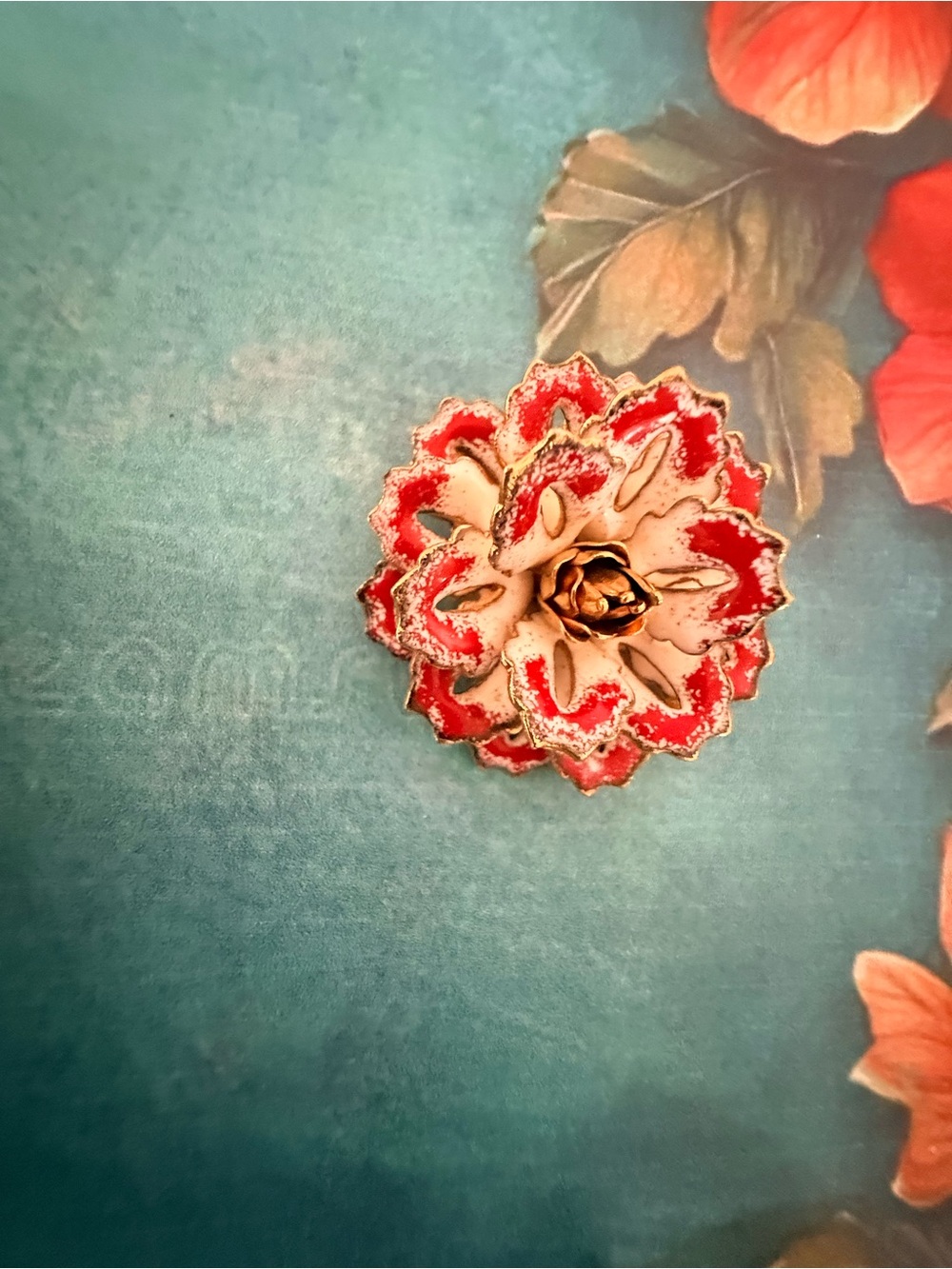 Small Red and Cream Floral Enamel Brooch.